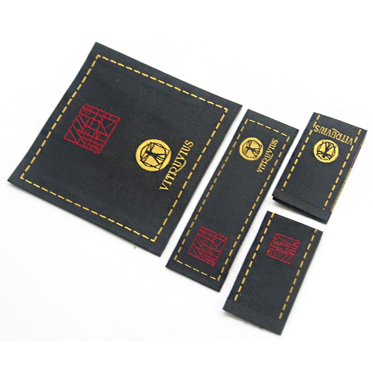 服裝輔料定做廠家織嘜水洗標定制男女裝勾邊高密緞面布標織標